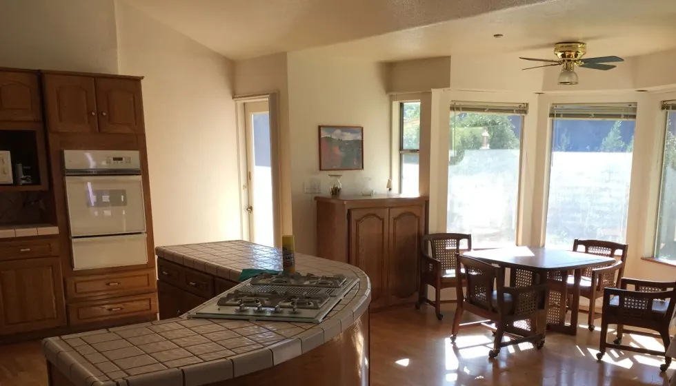 Kitchen and dining area of the retreat house in Brea, California